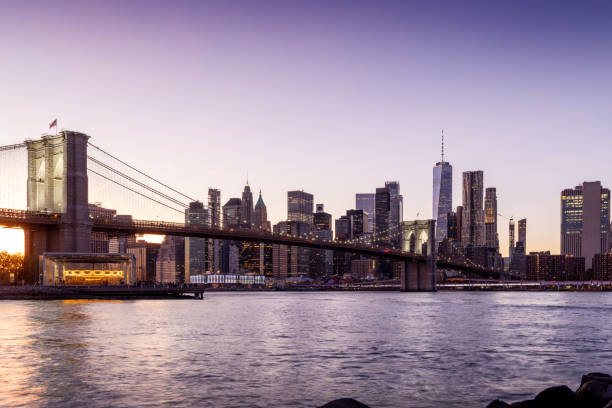 istock A panoramic sunset view of the Brooklyn Bridge stretching towards Manhattan 2196384336