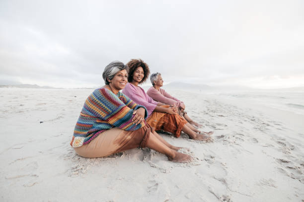 istock Exploring the world and finding joy with friends by the shore 2196386229