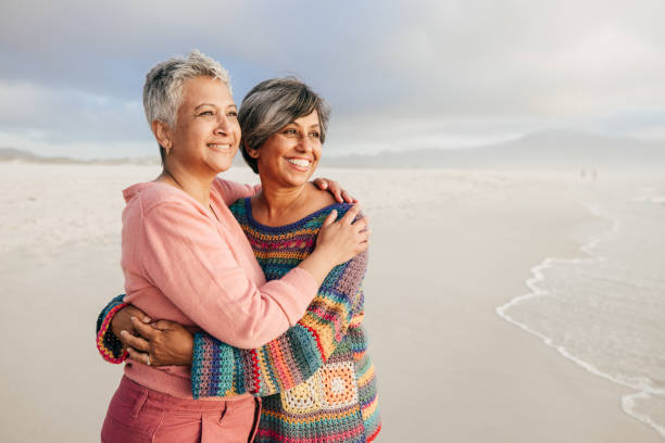 istock Exploring the world and finding joy with friends by the shore 2196386248