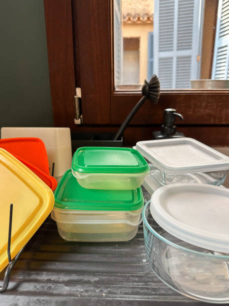 istock Plastic and glass containers food storage in the kitchen drainer 2196387363