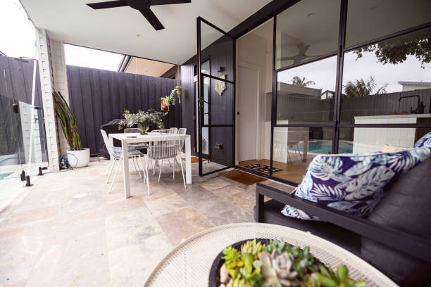 istock Modern Outdoor Patio Area with Dining Table and Cozy Decoration 2196389076