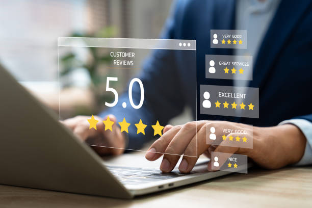 istock Customer satisfaction feedback survey, Man using laptop for online reviews and ratings to evaluate service quality reputation. Customer experience ratings and surveys for service excellence. 2196389196