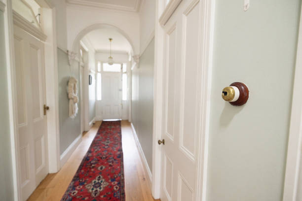 istock Elegant Home Hallway Featuring Vintage Decor and a Classic Persian Style Rug 2196391059