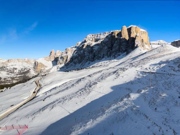 istock Sella pass Langkofel, Dolomites Alps with snow from drone 2196392789