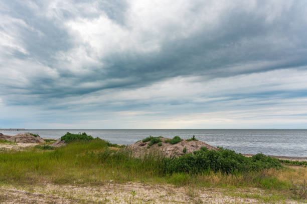 Storm clouds over an abandoned sea beach.