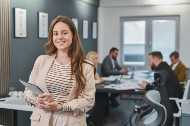 istock Beautiful Businesswoman Looking Confident Posing For Camera With Digital Tablet in Hands 2196395737