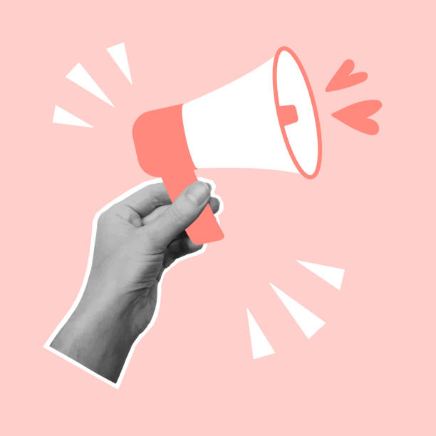 istock Valentine's day greeting card with cut out hand holding megaphone. 2196396588
