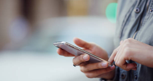 istock Smartphone, education and hands of student, online and checking of email for application results or typing. Outdoor, person and browsing for feedback from college, digital or waiting for notification 2196398061