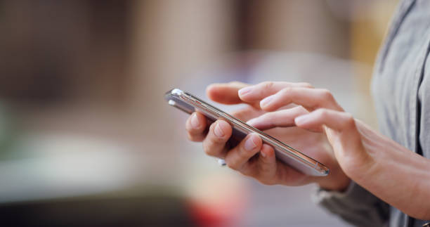 istock Student, education and hands with smartphone, city and checking of email for application results or typing. Outdoor, person and browsing for feedback from college, space and waiting for notification 2196398169
