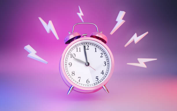 istock Pink Blue Colored Alarm Clock on Multi Colored Infinite Background with Wake Up Icons Around It 2196399901