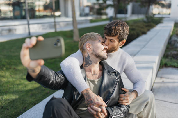 istock Candid moment of two lovers captured in selfies 2196402684