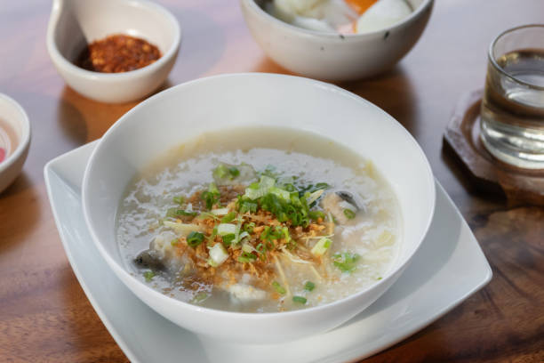 istock Rice congee with soft-boiled egg flavor with pickled chili vinegar and ground dried chilies 2196402912