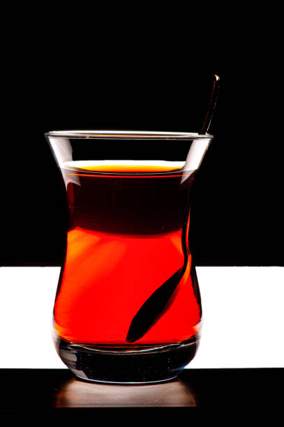 Red color of tea glass on black and white background