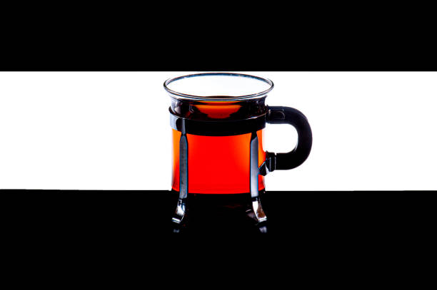 Red view of black tea in a teacup with handle