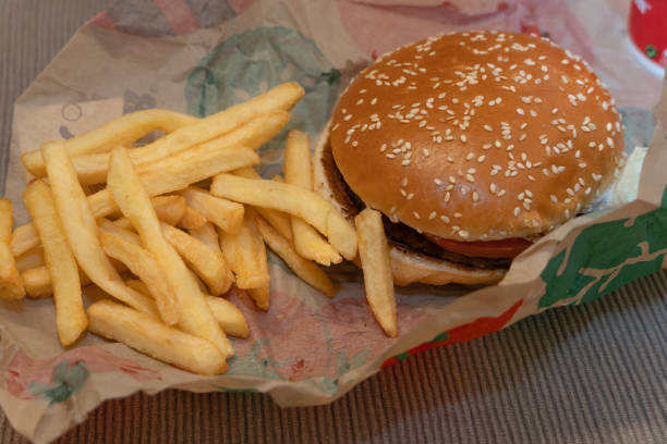istock Burger and Fries Meal on Paper Wrapper 2196410520