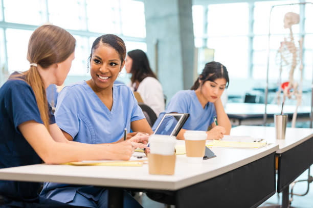 istock Two Female Medical Students Studying Together in Classroom 2196411262