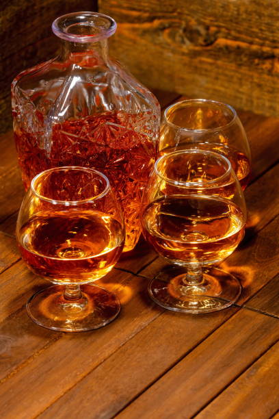 istock Cognac balloon with bottle on wooden background 2196412662
