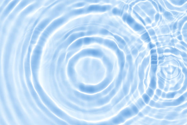 istock Water background,Summer blue water ripple surface texture wave in bathroom,Top view swimming pool with natural sunlight effect on abstract circle pattern for spa, cosmetic serum banner,Sea beach water 2196416402