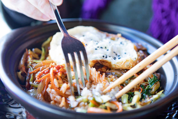 Bibimbap, Korean typical food. Rice, vegetables, egg, and beef.