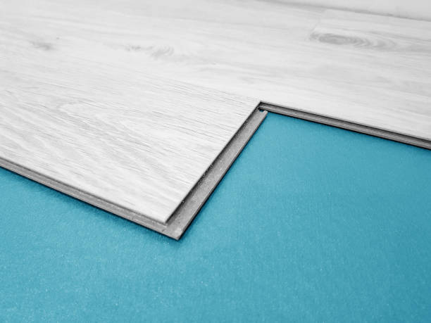 istock Installing Laminate Floor with underlays. Laying floor panels 2196416947