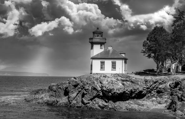 The Lime Kiln Light is a functioning navigational aid located on Lime Kiln Point overlooking Dead Man's Bay on the western side of San Juan Island, San Juan County, Washington, in the United States.