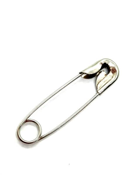 istock One metal safety pin with white background 2196421476