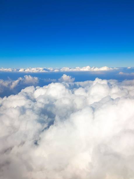 istock Aerial View of White Clouds Under Blue Sky 2196422063