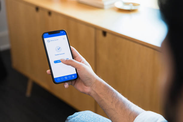 istock Successful Money Transfer on Mobile Phone App 2196422495