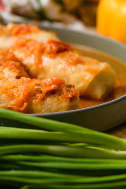 istock Close-up of stuffed cabbage rolls in tomato sauce. 2196424193