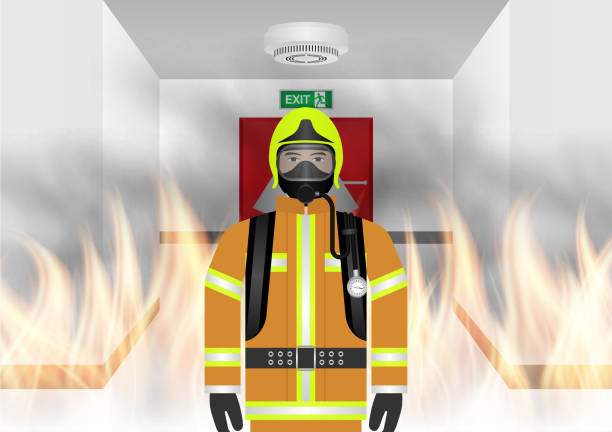 istock Firefighter Preparing to Fight with Fire Flame in Burning House or Burning Building. 2196424269