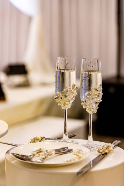 istock Beautiful glasses for a wedding reception close up 2196429777