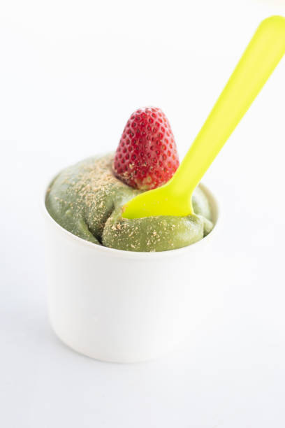Refreshing fresh green tea mochi ice cream with strawberry topping.
