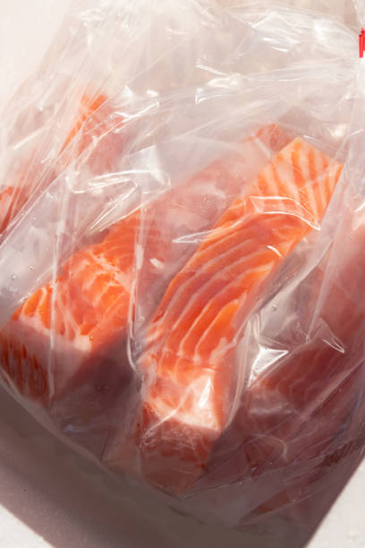 istock Fresh salmon fillets in vacuum packaging. 2196430716