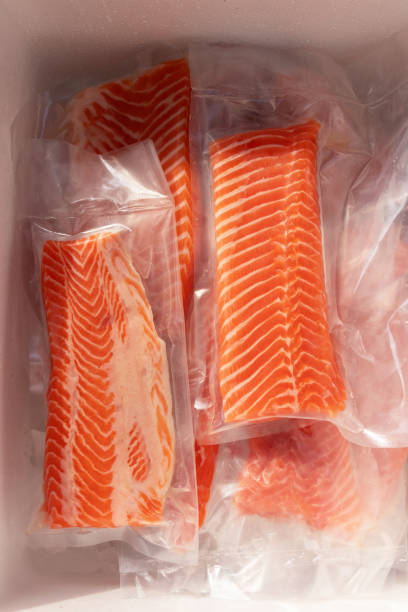 istock Fresh salmon fillets in vacuum packaging. 2196430731