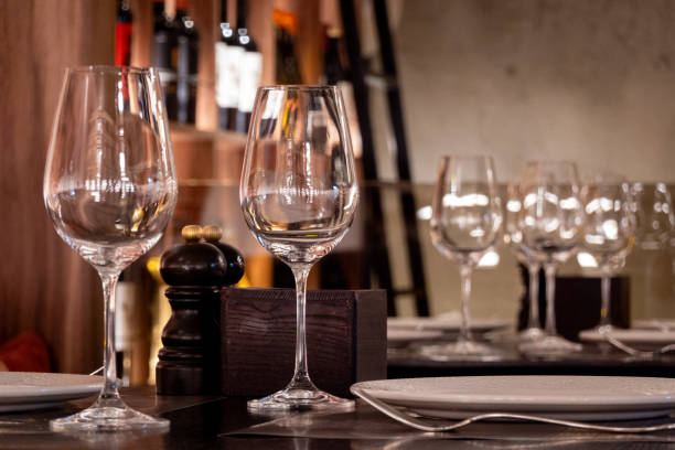 istock Empty wine glasses on a table at a fancy restaurant 2196431103