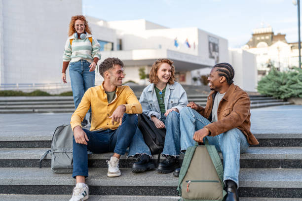 istock College students hanging out on campus 2196431146