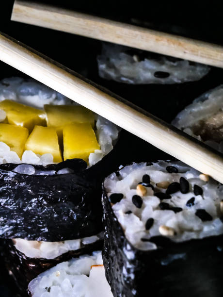 Maki sushi, rice and fish wrapped in Nori seaweed