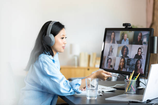 istock Woman in Video Conference Using Laptop, Casual Office 2196433260