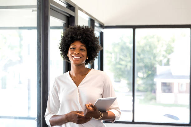 istock Confident African American Businesswoman using Tablet 2196433296