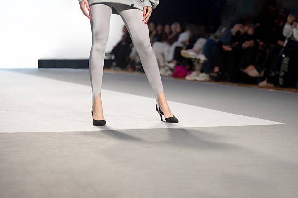 istock Gray leggings and high heels 2196434107