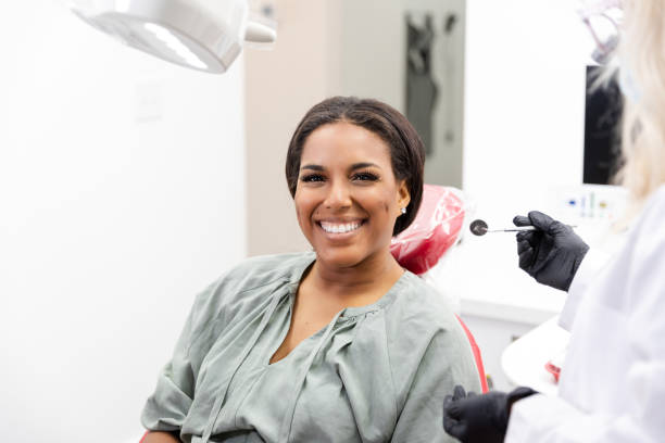 istock Confident Woman Smiling at Dentist Office 2196437400