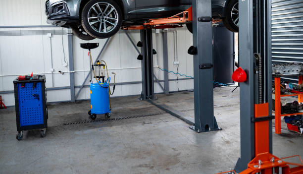 istock The mechanic is changing the oil. 2196439747