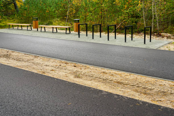 istock Contemporary ecological seaside environmental development, bike path, wooden benches, trash can 2196439850