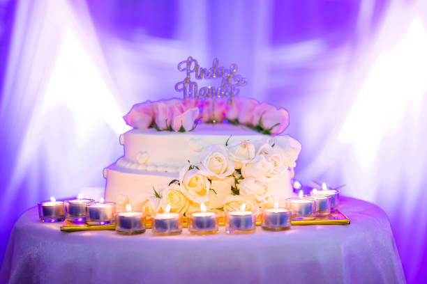Beautiful creamy white wedding cake decorated with flowers