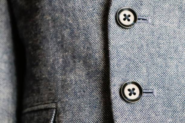 istock CloseUp View of a Stylish and Elegant Grey Jacket Featuring EyeCatching Buttons 2196451266