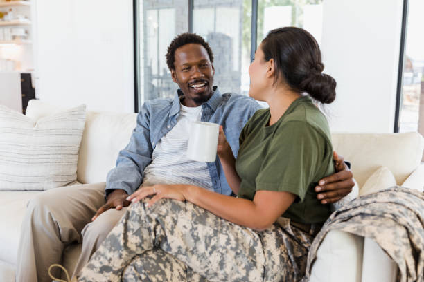 istock Couple relaxing at home, enjoying coffee together 2196455473