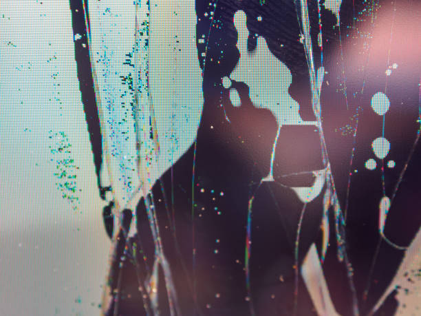 istock Close-up of broken LCD LED screen showing pixel distortion and texture, creating a digital drama effect. 2196460592