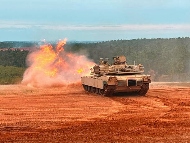 M1A2 Abrams Main Battle Tank (built by General Dynamics Land Systems) Firing at Red Cloud Firing Range at Ft. Moore, GA with muzzle fireball - Fall 2024