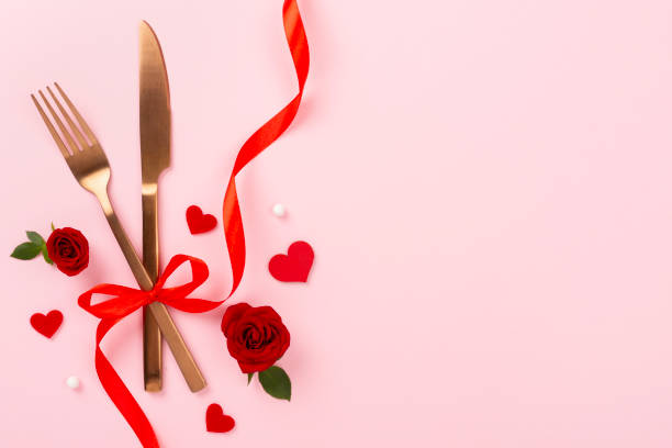 istock Table setting for Valentine's Day on color background, top view 2196463970