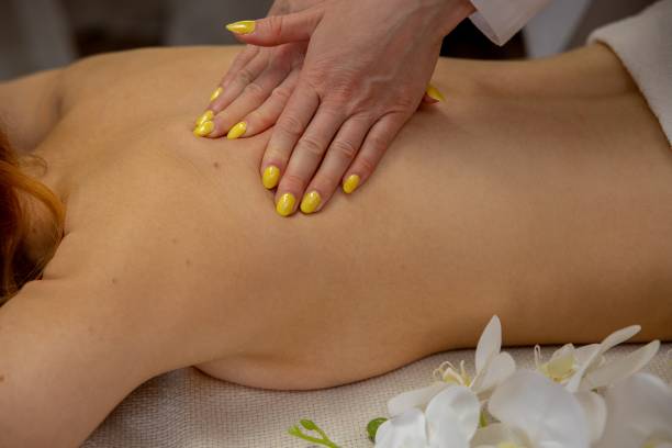 Enjoy a Truly Relaxing Massage Therapy Session While Wearing Delightful Yellow Nail Polish